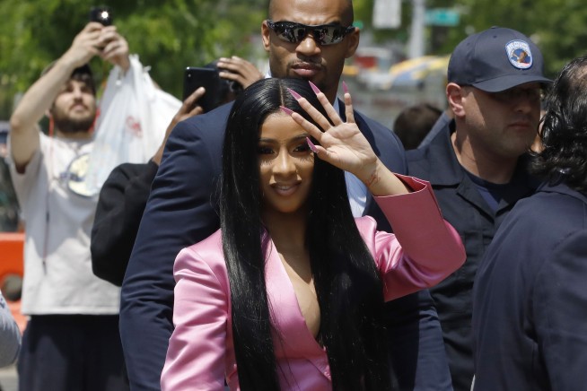 Cardi B hit with new felony charges in strip club brawl
