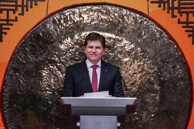 Stock market today: Asian shares drop after disappointing US inflation data sends Dow down