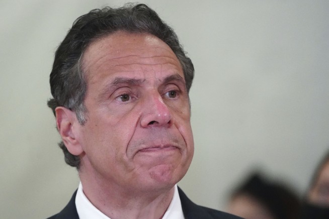 Woman says Gov. Cuomo forcibly kissed her cheeks in 2017