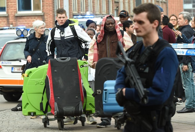 The Latest: Anti-terror raids in Belgium turn up nail bomb