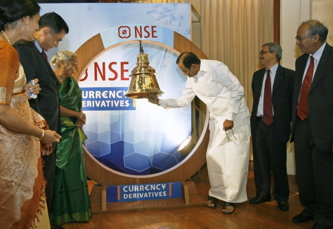 Ex-head of India's bourse fined over illegal leaks to guru