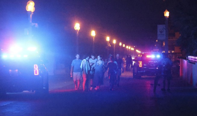 Florida police search for 3 gunmen who wounded 9 at crowded beach on Memorial Day