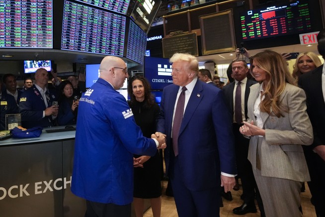 Stock market today: Wall Street’s rally stalls as Nasdaq pulls back from its record