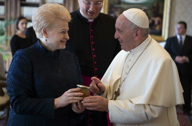 Pope explains reluctant ring kiss: Fear of spreading germs