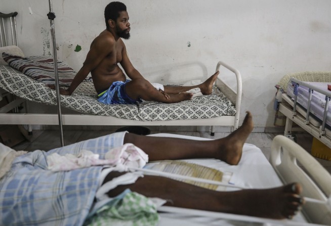 The death toll in a gang attack on a Haitian town rises to at least 115