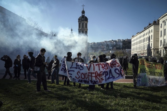 France's Macron risks his government to raise retirement age