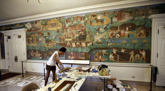 Author sues to stop removal of controversial Kentucky mural