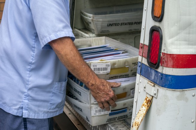 Trump opposes postal money that would help vote-by-mail