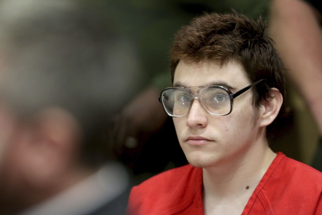 Public defender asks to drop Florida school massacre suspect