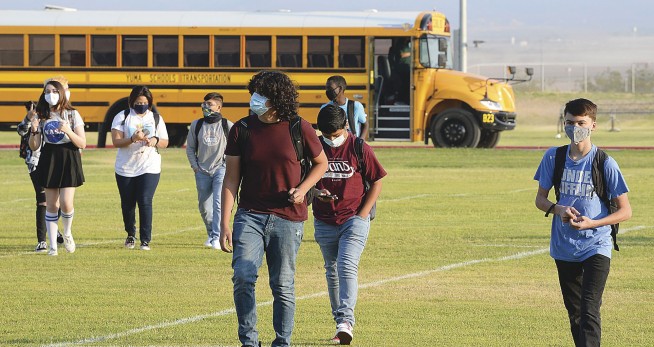 1 arrest after clash over Arizona school's COVID mandates