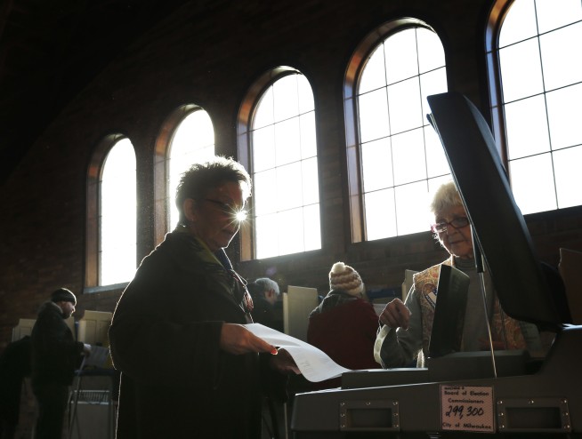 The Latest: Wisconsin voter turnout projected at 40 percent