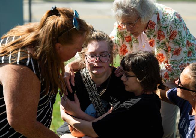 Gunman opens fire at Michigan church and sets it ablaze, killing at least 4 and wounding 8