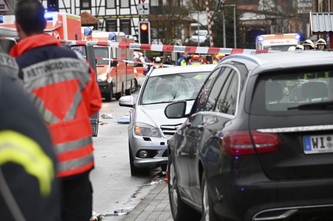 Car hits crowd at Carnival in German town; dozens injured