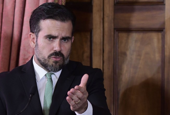 Puerto Rico gov will not seek re-election, leaves his party