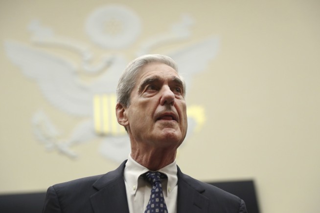 The Latest: Mueller says Russia hoped to benefit from Trump