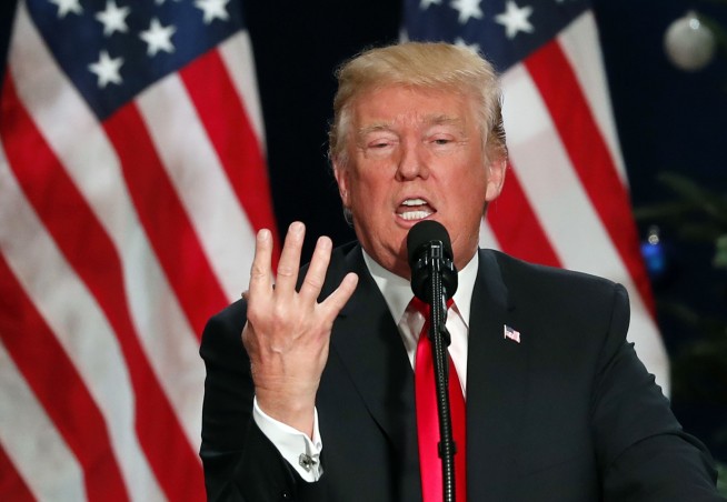 The Latest: Britain's May says Trump's retweets were wrong