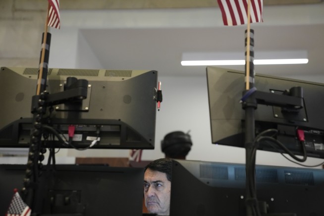 US stock indexes fall as lockdown protests spread in China