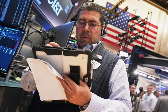 The Dow hits a record as 3M, Coca-Cola and other big US stocks climb
