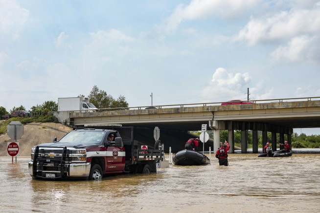 Hundreds rescued from flooding in Texas as waters continue rising in Houston