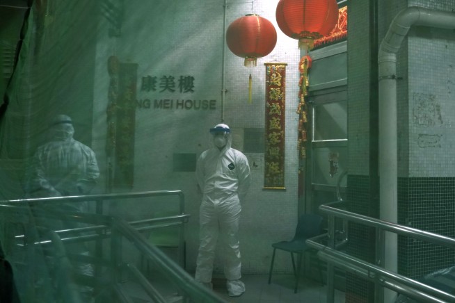 China's daily death toll from virus tops 100 for first time