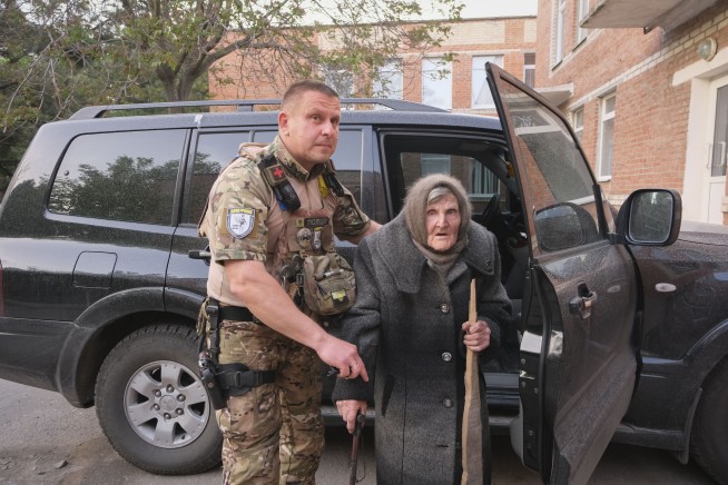 A 98-year-old in Ukraine walked miles to safety from Russians, with slippers and a cane