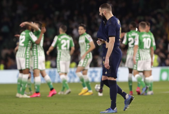 Champions League games postponed as virus hits world soccer