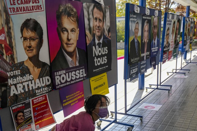Macron challenged by far right as French vote for president
