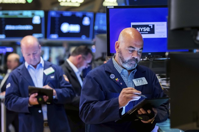 Stocks slip on Wall Street as messy May comes to a close