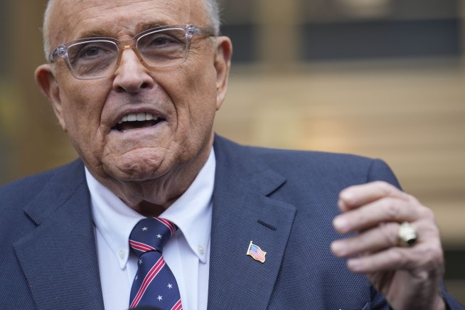 Rudy Giuliani draws rebuke for a courtroom outburst accusing judge in assets case of being unfair