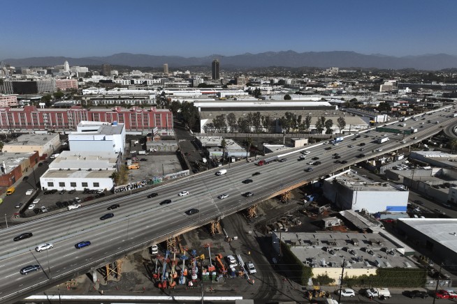 Los Angeles freeway is fully reopened after arson fire, just in time for Monday morning's rush hour