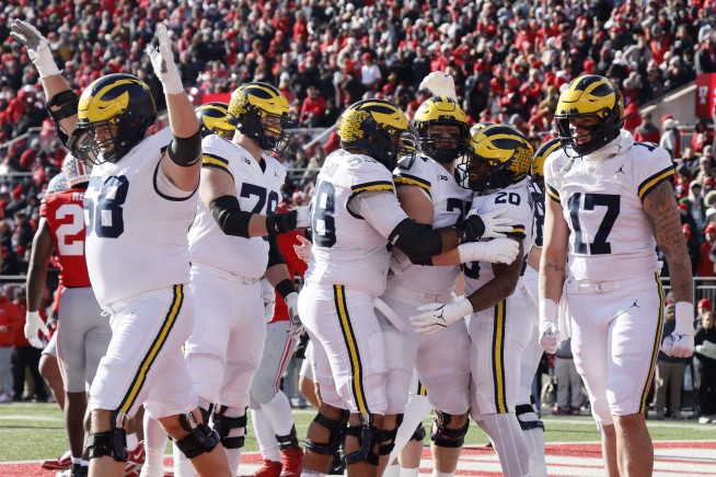 Michigan, Ohio State players brawl after Wolverines beat No. 2 Buckeyes. Police use pepper spray