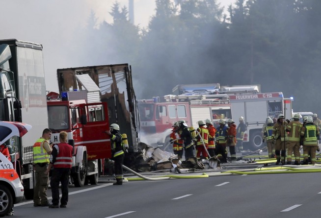 The Latest: Police say group from Germany aboard crashed bus