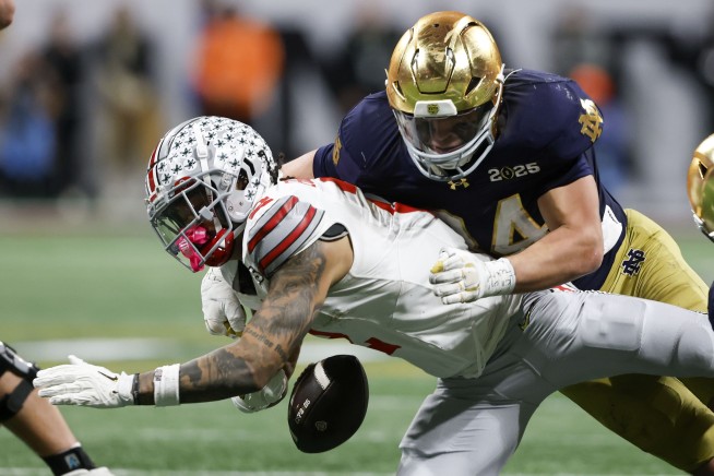 Ohio State wins 1st national title since 2014, outlasting Notre Dame 34-23 in CFP championship game
