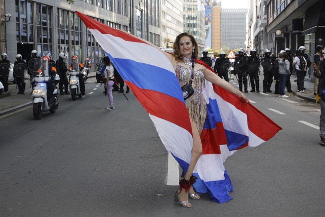 Partiers protest Belgium virus rules; medics demand support