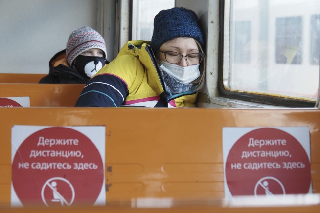 The Latest: Fans from abroad barred from Tokyo Olympics