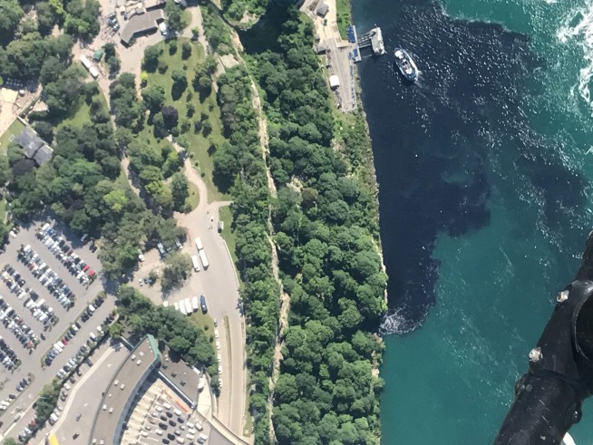 Discharge turns water at base of Niagara Falls black