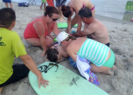 Beachgoers lose limbs in shallow-water shark attacks
