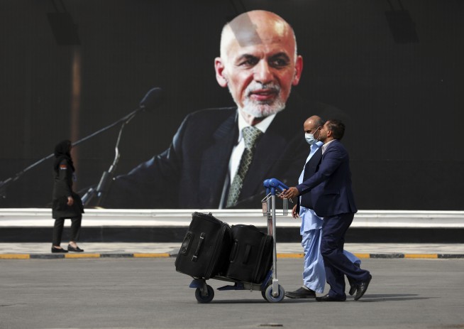 A year on, ex-Afghan leader defends role in Taliban takeover