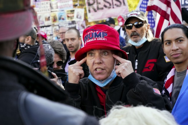 Trump hails progress on vaccine in first remarks since loss