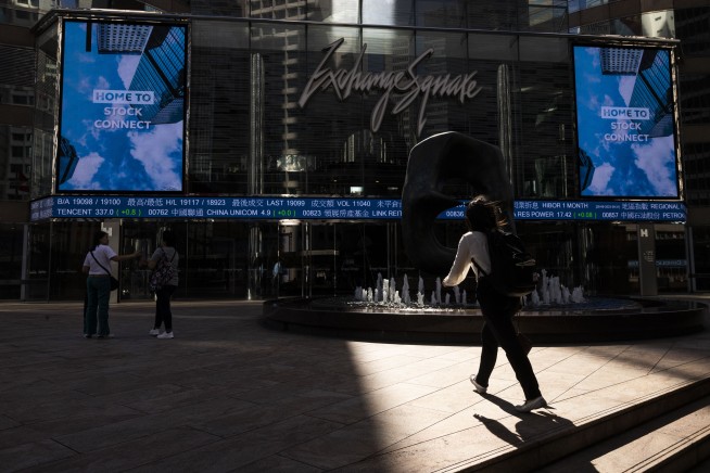 Stock market today: Asian shares are lower after central bankers say interest rates must stay high