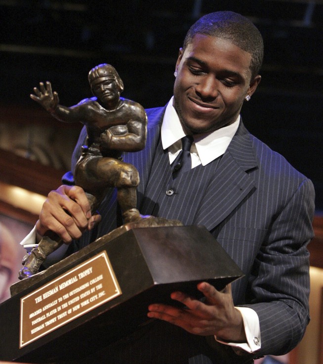 Reggie Bush is reinstated as 2005 Heisman Trophy winner, with organizers citing NIL rule changes