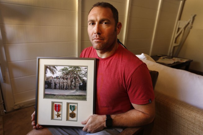 US defense chief: Don't seek repayment of enlistment bonuses