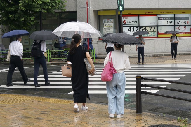 Stock market today: Asian stocks mixed amid volatile yen after Wall St climbs on inflation report