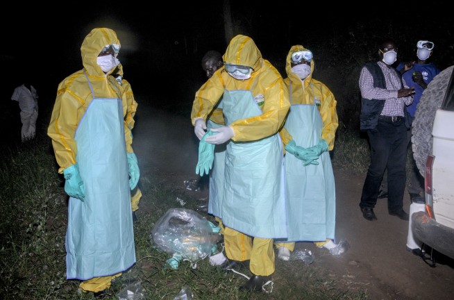 Burial of Ugandan Ebola victim shows flash of confrontation