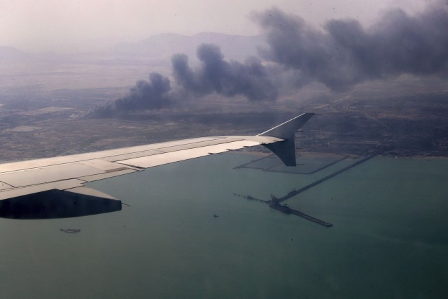 Iran says fire extinguished at a port rocked by explosion as the death toll rises to at least 70