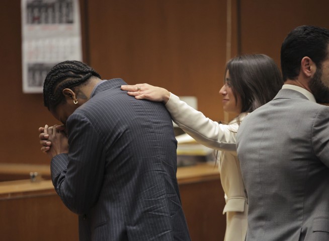 A$AP Rocky dives into Rihanna's arms as not guilty verdict is read at felony assault trial