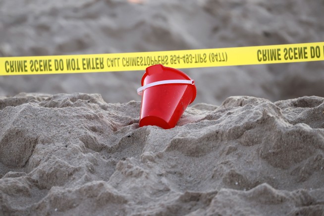 Young girl killed when a hole she dug in the sand collapsed on a Florida beach, authorities say