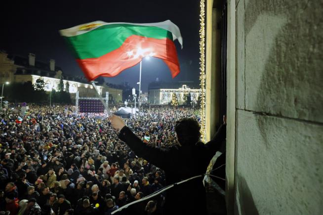 Bulgaria's government resigns after mass protests and just weeks before nation due to join eurozone