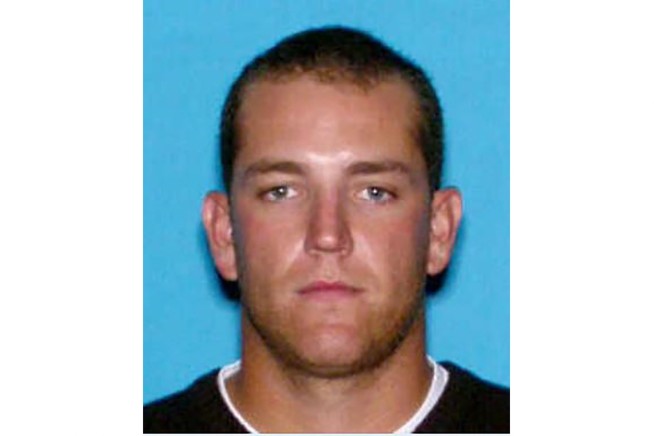 Ex-pro baseball player sought in woman's killing found dead