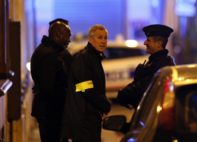 The Latest: Macron firm after Paris stabbing claimed by IS